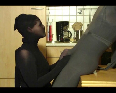 Encasement Blowjob - Yvonne is completely encased in black pantyhose. She first strokes the cock of her friend. And then she sucks him until the orgasm.