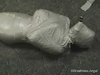 Duct Tape Mummy Part 3 - Angels first time being mummified was not her happiest of moments, and we both agree there are some things that could have gone better. Either way, doesn�t she look damn hot like that???