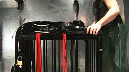 Rubber & Bondage Central! - Bound To The Cage Rubber & Bondage Central! - Bound To The Cage