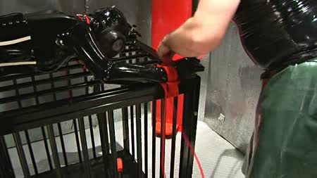 Rubber & Bondage Central! - Bound To The Cage Rubber & Bondage Central! - Bound To The Cage