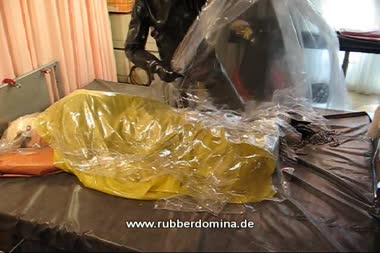 Plastic And Bondage - Mistress play with her rubberdoll in a lot of plastic.
bound in a black catsuit the doll get more and more layers of plastic!
enjoy the smell of plastic and rubber!