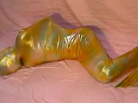 Captured In Mermaid Zentai - A bound and gagged man is covered with a gold mermaid zentai.
moreover, he is pushed into a white satin sack.
he has kept struggling in such the hopeless heavy bondage.

-----------------
 'wabi-sabi-moe', the japanese bondage website.
http://nekonekorin.Sarm.Net/index_english.Html