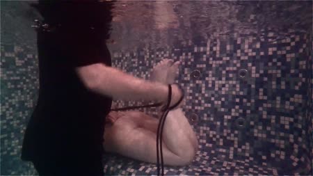 Dash underwater bondage - In this series you will see that Dash is not afraid to be helpless in the hands of the coach. He decides how long it is to lie under water with bound hands and feet and Dash can only breathe with his help.